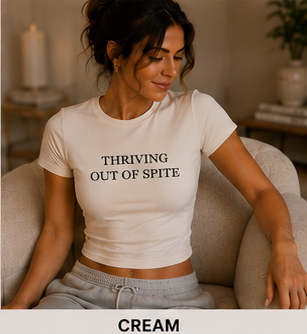 THRIVING OUT OF SPITE — Crewneck Baby Tee Cream